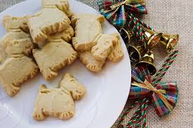 Twelve days of cookies and treats perfect to share with friends and family or for a delicious holiday table of your own. Christmas Shortbread Shortbreads Biscuits Cookies Scottie Dog Scottish Terrier Shapes Plate Tartan Bells By Kerin Forstmanis Photo Stock Snapwire