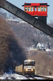 What A Difference 127 Years Makes Southbound Hopper Train 555 Was Powered By Ns 9914 Was Built By Genera Norfolk Southern Railroad Photography Railroad Photos