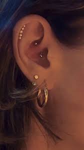 what is a curated ear a curated ear can be your very own unique master piece to start with you earings piercings cute ear piercings multiple ear piercings