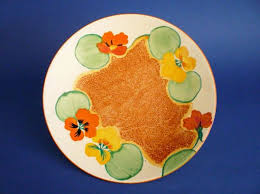 I'm getting it fixed this weekend. Fine Clarice Cliff Bizarre Nasturtium Large Cake Plate C1932