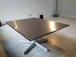 A table is a versatile piece of furniture, often multitasking as dining, working, studying, gaming, and living area. Minimalist Height Adjustable Rotating Coffee Table Ikea Hackers