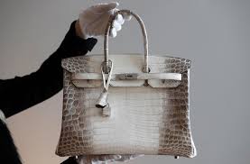 The blue crocodile hermes birkin handbag was sold at the. How Much Does A Hermes Birkin Bag Cost What S The Most Expensive One Ever Sold And How Many Versions Are There