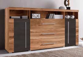 Die stillvollen verzierungen an korpus und holzbeinen und dem schwarzen metallgriffen an den schubladen lassen dieses möbelstück zum. Sideboard In Braun Dunkelbraun Online Kaufen Otto