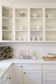 Open kitchen shelves can be easily made from older kitchen cabinetry. The Intersection Of Design Motherhood Top Lifestyle Blog Design Mom Upper Kitchen Cabinets Open Kitchen Cabinets New Kitchen Cabinets