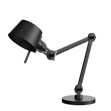 Italian brass desk lamp with heavy brass counterbalance weight and pivoting black cone shade that lights up and down. Bolt Desk 2arm Foot Small Color Smokey Black
