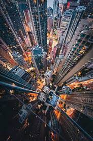 Maybe you would like to learn more about one of these? Hd Wallpaper Person Standing On Top Of High Rise Building Foot Light Night Wallpaper Flare