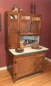 Antiquing cabinets is the process of applying a dark glaze to a lighter cabinet door, to give it the appearance of old age and wear and tear. Antique Kitchen Original Sellers Oak Hoosier Style Roll Top Pantry Cabinet 1900s 795 00 Picclick