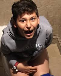 On my son's 15th Birthday I wanted to share my favorite pic of him. I took  this pic over the top of a bathroom stall and as you can see he was