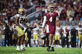 Florida State fans demand DJ Uiagalelei is benched after shock loss to Boston  College as brutal chant is overheard on TV | The US Sun