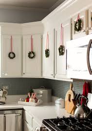 Christmas In The Kitchen With Mini Wreaths Holiday Decorating Ideas In Kitch Christmas Kitchen Decor Christmas Decorations Apartment Holiday Decor Small Spaces