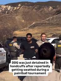 DDG was just detained in handcuffs after reportedly getting swatted during  a paintball tournament 👀💥 Footage from the scene shows police stepping in  mid-event, leaving fans stunned and confused. While swatting has