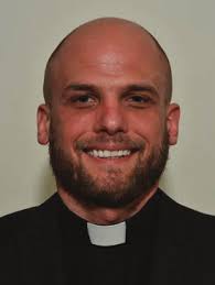 FIVE MEN ORDAINED AS DEACONS BY BISHOP BRENNAN