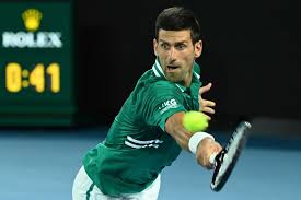 Djokovic smiles at madrid 2017 volley winner. At7kswlt2y8aym