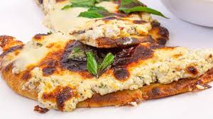 This homemade flatbread pizza recipe is perfect for a weeknight dinner idea. Roasted Garlic White Flatbread Pizza Recipe Rachael Ray Show Garlic Flatbread Flatbread Pizza Roasted Garlic