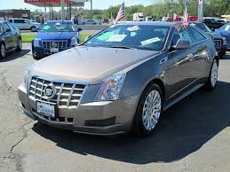Image result for Mocha Steel 2012 Cadillac