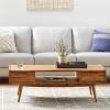 Made from teak wood and veneer. 1