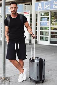 Black And White Shorts Outfit Men A Black T Shirt Black Nike Shorts White Sneakers And A Backpack For Comfy Travelling Summer Outfits Men Mens Summer Outfits Mens Fashion Summer