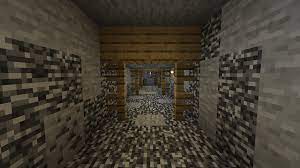 Look for a tunnel that contains a minecart with a chest in it. Found An Abandoned Mineshaft At Bedrock Created A Nice Texture I Think Minecraft