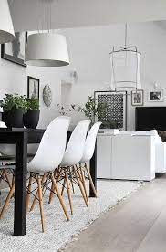 White pillows create contrast against a pure black banquette, with clean lines that are equal parts modern and cozy. 26 Scandinavian White Home Decor Ideas Home Decor Interior Design Home
