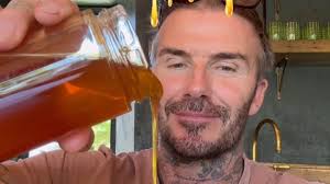 David Beckham packages up home-harvested honey once cheekily dubbed his  'sticky stuff' by wife Victoria
