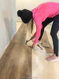 Unlike the regular flooring option, the vinyl plank flooring comes in narrow and long strips as opposed to conventional tile shapes. Installing Diy Vinyl Rigid Core Flooring Over Cement Four Generations One Roof
