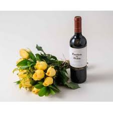 To get a perfect blend of wine with flowers and cakes, select from our widest selection of great wine and food combos. Manaus Bouquet Of 15 Yellow Roses And Red Wine Flower Delivery 15 Yellow Roses And Wine Flower Delivery Manaus Online Florist Manaus