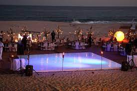 Tips For Your Wedding Dance Floor Djs Songs And Props Make A Difference Dance Floor Wedding Beach Wedding Reception Beach Wedding