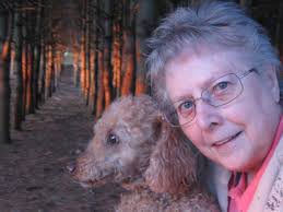 For Lacey My friend has flown across the Rainbow Bridge She leaves behind  all friends and family I can see her, standing tall along the ridge Her  body straight and strong, and