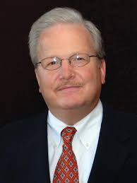 Patient awake for brain surgery plays sax to signal success.