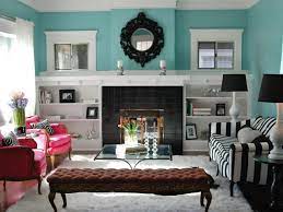 Use reclaimed boards with scarred and crazed paint still clinging to them. How To Build Bookshelves Around A Fireplace Hgtv
