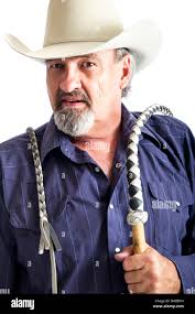 Holding whip man hi-res stock photography and images