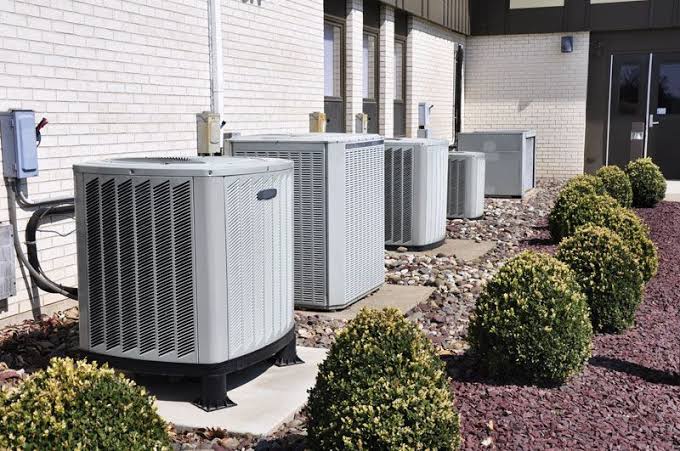 Professional HVAC technicians providing heating and cooling service in Bastrop