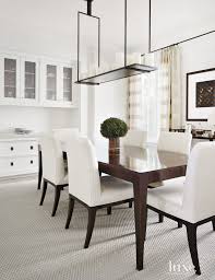 Transitional White Dining Room With Candle Light Fixture Transitional Dining Room White Dining Room White Sitting Room