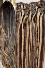 For those with dark to brown hair, the combo of brown with blonde highlights are a great way to refresh your hair as you add some new depth and dimension to your features. 18 100 Highlighted Human Hair Wrap Around Ponytail Hair Extensions 4 613 Dark Brown Mixed With Platinum Blonde Hair Faux You