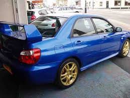 2005 toyota camry solara sle v6 coupe automatic · 2005 nissan 350z base coupe manual · 2005 subaru impreza wrx sti with gold wheels sedan 2.5 Gold Wheel Paint Code Scoobynet Com Subaru Enthusiast Forum