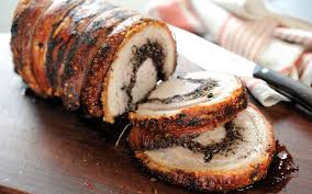 The carcass is deboned, arranged carefully stuffed with liver, wild fennel, all fat and skin still on spitted, and/or roasted, traditionally over wood for at least 8 hours. Porchetta With Blueberries And Hazelnuts Recipe Barbecuebible Com