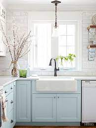 Barn doors add a lot of farmhouse appeal to the kitchen. 10 Stunning Farmhouse Kitchens With Coloured Cabinets The Happy Housie