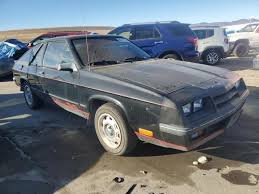 Image result for Black 1984 Plymouth