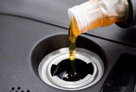 Once your car has cooled off, turn the ignition to its first position (don't start the engine). What To Do If You Run Out Of Oil In The Car 7 Steps
