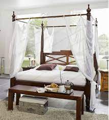 Alternatively you can opt for a dominant canopy bed that will really take charge of the room. Wooden Four Poster Bed 180x200 Cm Made Of Acadia Wood Nougat Or Honey With White Cover Supply24