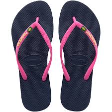 Chinelo feminino, confeccionado em borracha, tira de dedo com marca em alto relevo. Chinelo Havaianas Slim Brasil Havaianas