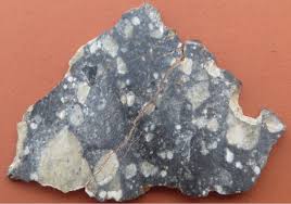 A meteorite is a solid piece of debris from an object, such as a comet, asteroid, or meteoroid, that originates in outer space and survives its passage through the atmosphere to reach the surface of. Feldspathic Breccia Lunar Meteorite Mineral Information Data And Localities