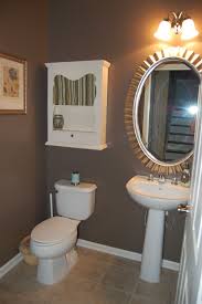 It creates an outstanding look of wall blended with a white mirror frame in the middle. Powder Room Bathroom Color Bathroom Wall Colors Small Bathroom Colors Bathroom Colors