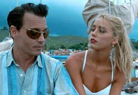 'tell the world johnny, tell them. Johnny Depp S Defamation Lawsuit Moving Forward As Amber Heard S Dismissal Is Denied