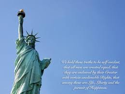 A piece of sculpture can have a hole through it and not be weakened if the hole is of a studied size, shape, and direction. Statue Of Liberty With Quote Photograph By Gregory Lovett