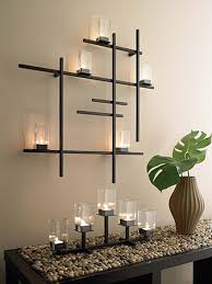 Lend a charming candlelit glow to the home interior by adding this lotus candle holder, to any tabletop, mantel or shelves for an added glow. Metal Wall Art Candle Holder Ideas On Foter