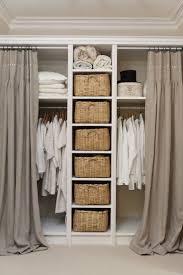 It's difficult to figure out how to organize a small closet. 9 Ways To Store Clothes Without A Closet Clothes Storage Without A Closet Closet Bedroom Closet Curtains