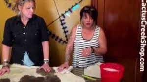 Use a soft brush, with plastic bristles. How To Clean A Cowhide Rug Youtube