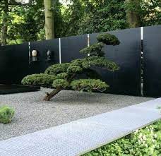Zen Garden Fence We Minimalist Simple Like The Pebbles Bonsai And Black Fence Boards Perhaps Use A Varian Modern Garden Landscape Design Japanese Garden Design