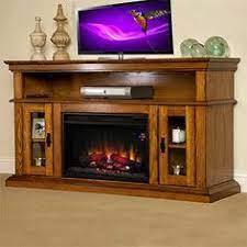 64 inch greatlin tv stand for tvs up to 70 inch, black walnut (electric fireplace sold separately) customize your tv stand with a classicflame 25 inch or 26 inch electric fireplace insert (sold separately) accommodates most flat screen tvs up to 70 inch and up to 105 lbs. 23 Fireplace Media Consoles Ideas Fireplace Media Console Fireplace Electric Fireplace
